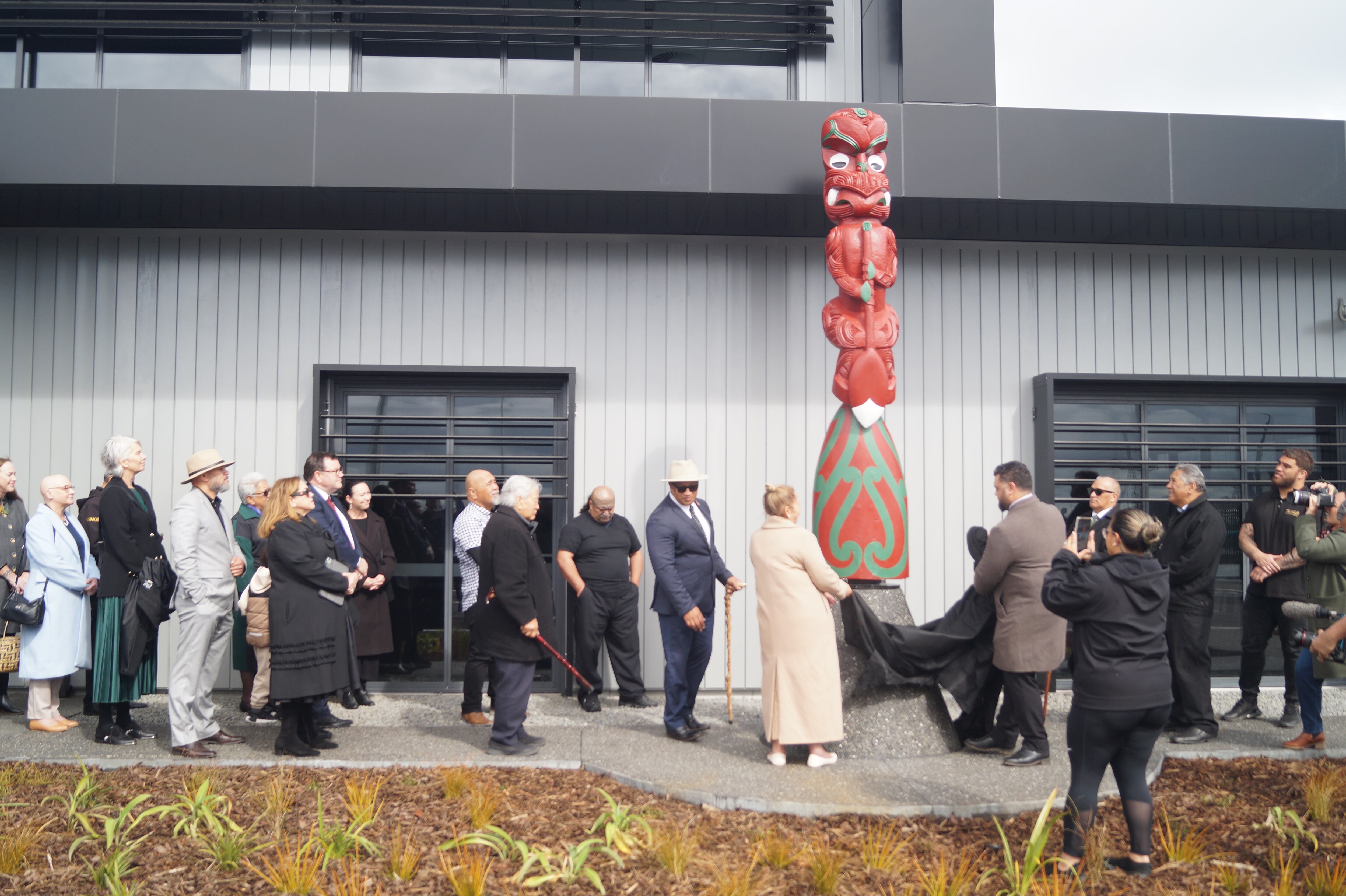 Mana whenua unveiled a pou, located in front of the Kmart Distribution Centre.