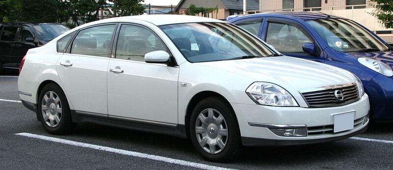 Police are seeking details on a white 2005 Nissan Teana, registration HLQ924, especially concerning its location on the day of the shooting.