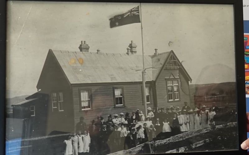 Papatawa School principal Wynita Katene looks at an old school picture.