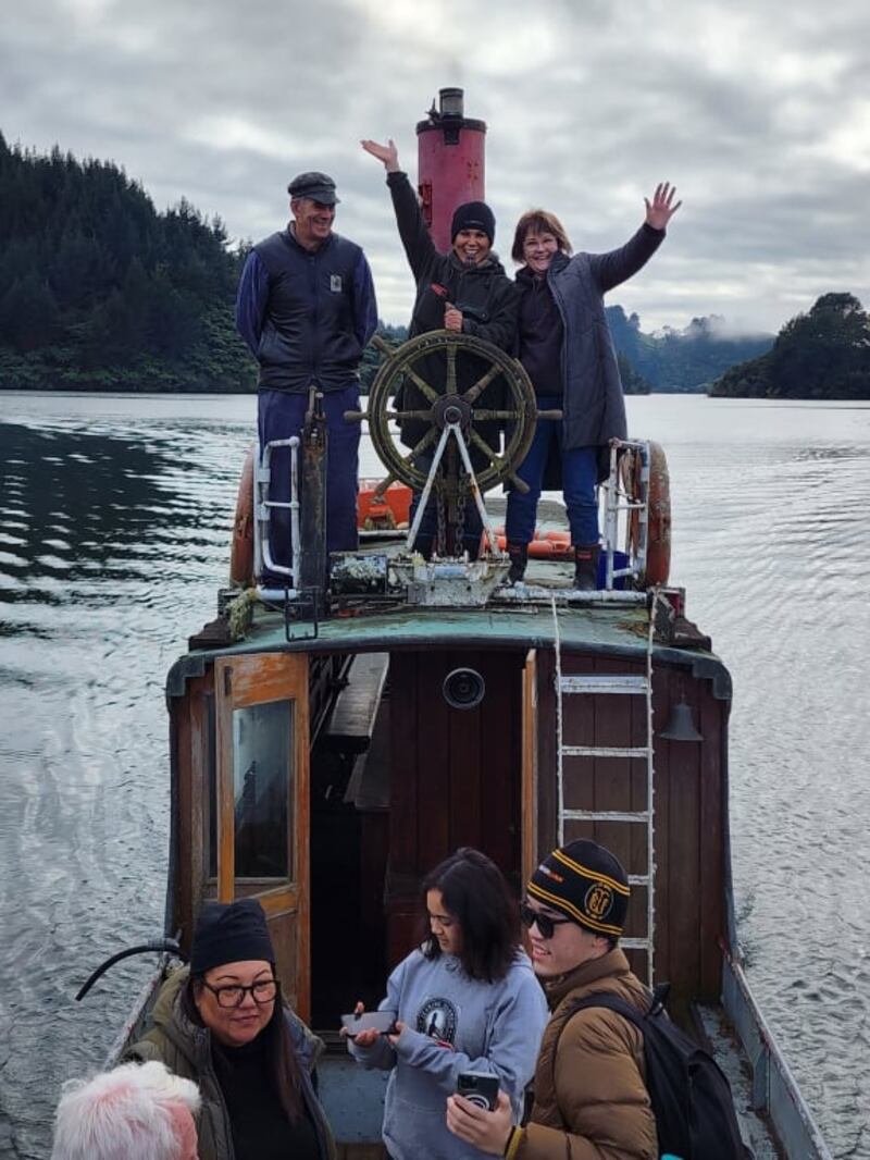 Volunteer project lead Steve McClune, Ariana Paul and Whanganui Riverboat Restoration and Navigation Trust chair Marion Johnston on head for the slip from the recovery site.